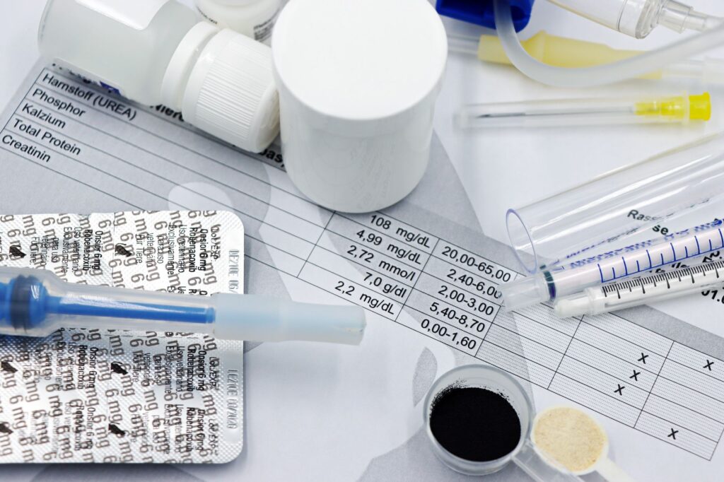 Laboratory technician processing blood samples and diagnostic tests